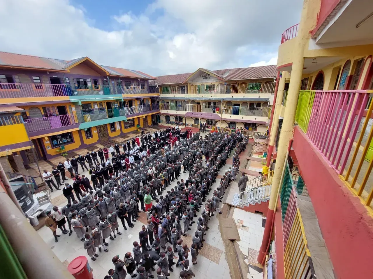 Assembly in the colourful school courtyard