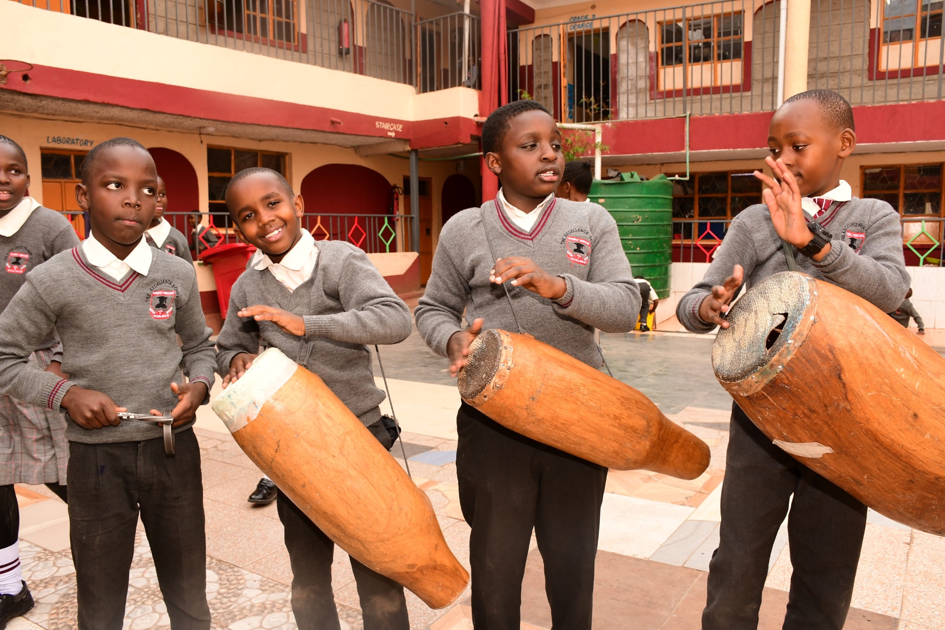 Students drumming at a cultural performance